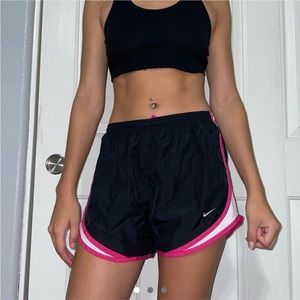 Black Nike running shorts w/ pink and white detail